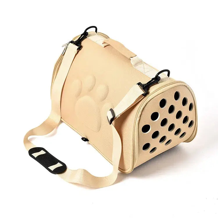 Comfort small dog carrier in beige with breathable mesh and adjustable straps for easy travel.