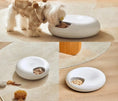 Load image into Gallery viewer, adorable small dog using a WiFi smart pet feeder for portion control in a stylish home setting