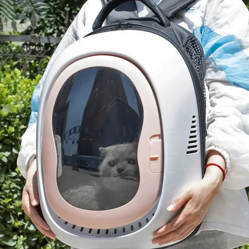Space Capsule Cat Backpack showcasing a cat in a transparent window, designed for stylish and comfortable travel.