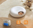 Load image into Gallery viewer, WiFi Smart Pet Feeder on a floor with a small dog, featuring 3600mAh battery and 25-day endurance time.