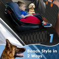 Load image into Gallery viewer, Child sitting in a car with a 5-in-1 waterproof dog car seat cover in bench style, featuring a small dog nearby.