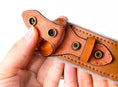 Load image into Gallery viewer, Close-up of the adjustable strap and metal fasteners on the Anti-Lost Dog Harness with Airtag Holder.