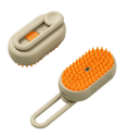 Load image into Gallery viewer, Steam Brush Pet 3 in 1 Spray Electric Brush for grooming pets by LittlePawGive showing devices orange bristles and control buttons