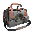 Load image into Gallery viewer, Stylish grey pet carrier with safety features, multiple pockets, and adjustable shoulder strap for comfortable travel.