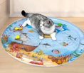 Load image into Gallery viewer, Cat relaxing on Summer Cooling Pet Water Bed from LittlePawGive featuring ocean-themed design perfect for keeping pets cool and comfortable