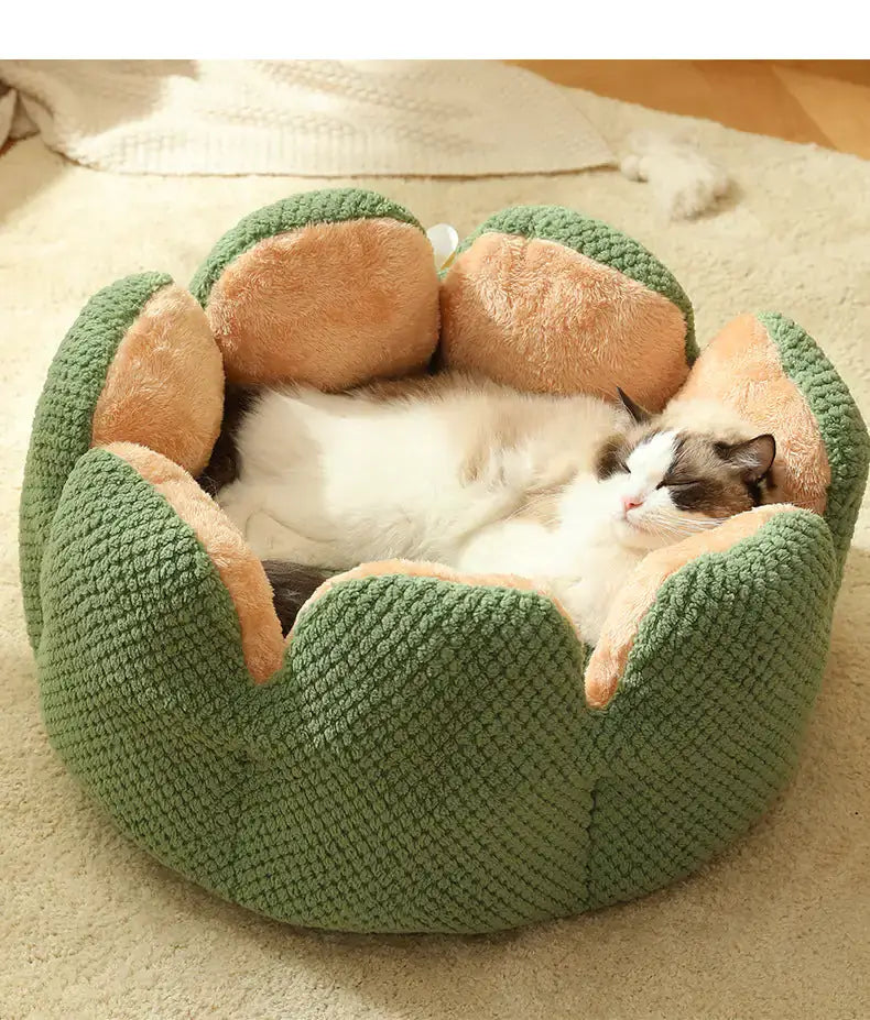 Cozy cat sleeping in a warm green Cactus Petal Pet Nest by littlepawgive, providing comfort and style for pets.