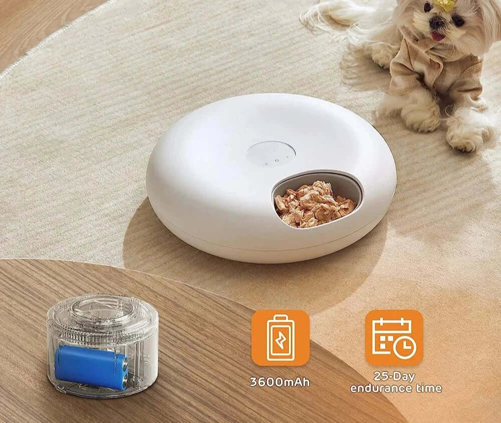 WiFi Smart Pet Feeder on a floor with a small dog, featuring 3600mAh battery and 25-day endurance time.