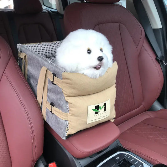 Cute fluffy dog sitting in a Comfort Dog Car Seat in a car, enjoying a safe and comfortable travel experience.