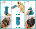 Load image into Gallery viewer, 2-in-1 dog paw cleaner and grooming brush in use, demonstrating easy cleaning process for muddy paws.
