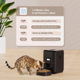 Load image into Gallery viewer, Smart pet feeder for cats dispensing food, showcasing feeding schedule and portion control options.
